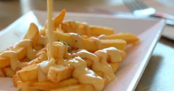 Fries with Cheddar Cheese - Pizza Corner