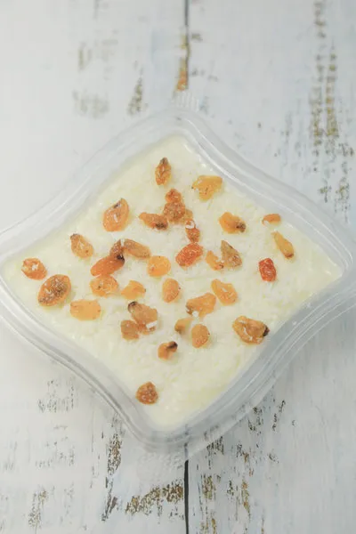 Milk Pudding with Coconut and Raisins - Tom and Basal