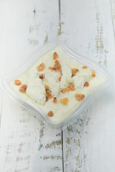 Milk Pudding with Coconut, Raisins and Qeshta - Tom and Basal
