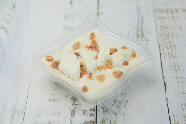 Rice Pudding with Coconut, Raisins and Qeshta - Tom and Basal